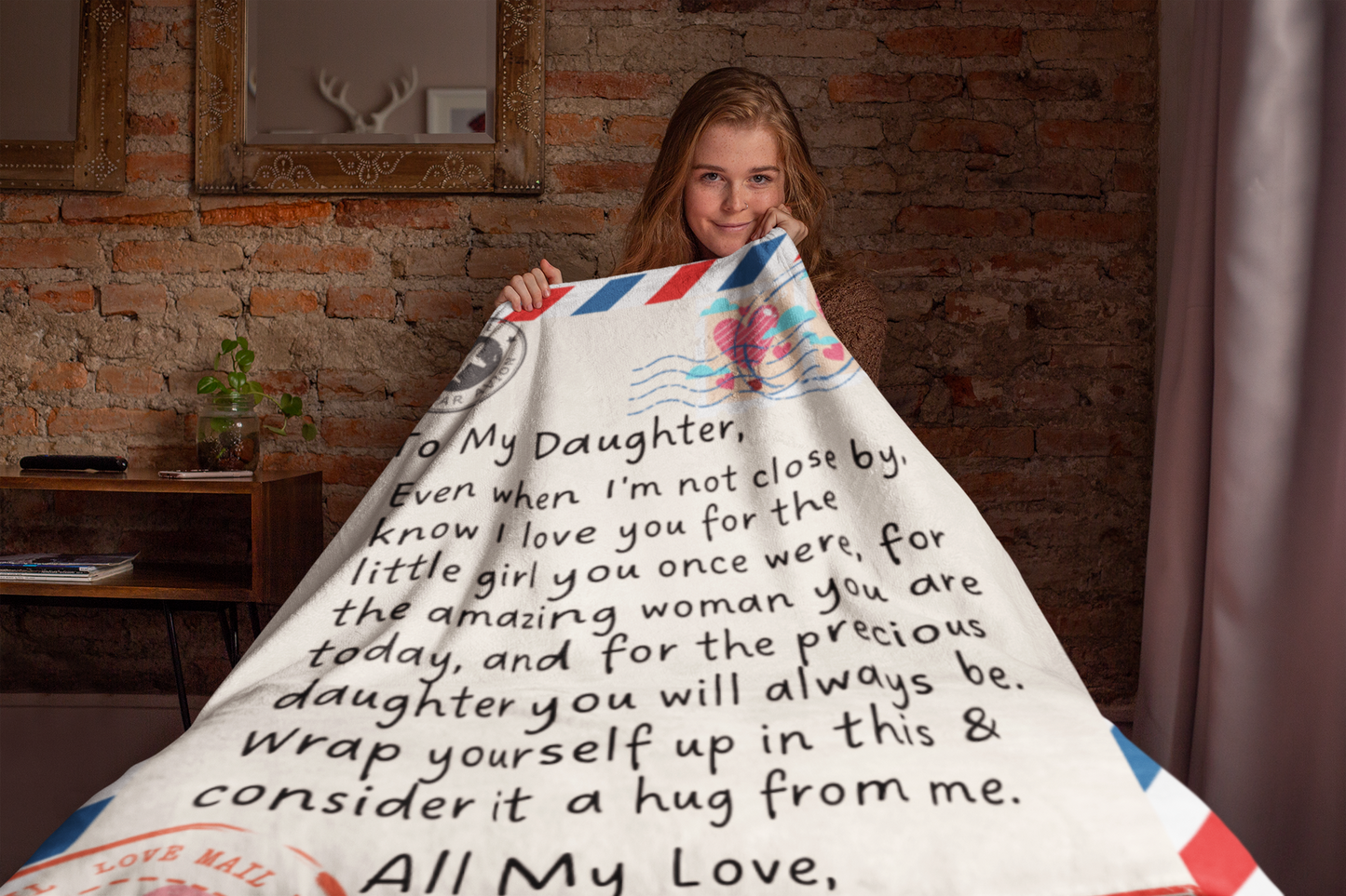Soft Sherpa Style 50 inch wide by 60 inch long blanket. Airmail envelope design with a message that reads: To My Daugher, even when I'm not close by, know I love you for the little girl you once were, for the amazing woman you are today, and for the precious daughter you will always be. Wrap yourself up in this & consider it a hug from me. All my love, Mom